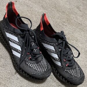 Adidas Black and White Athletic Shoes with pink Accents